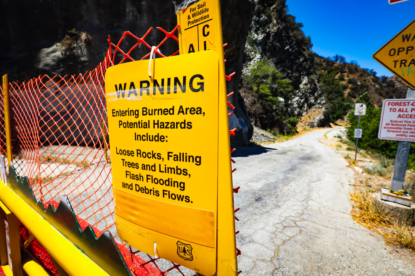 Close-up view of a potential hazards warning sign