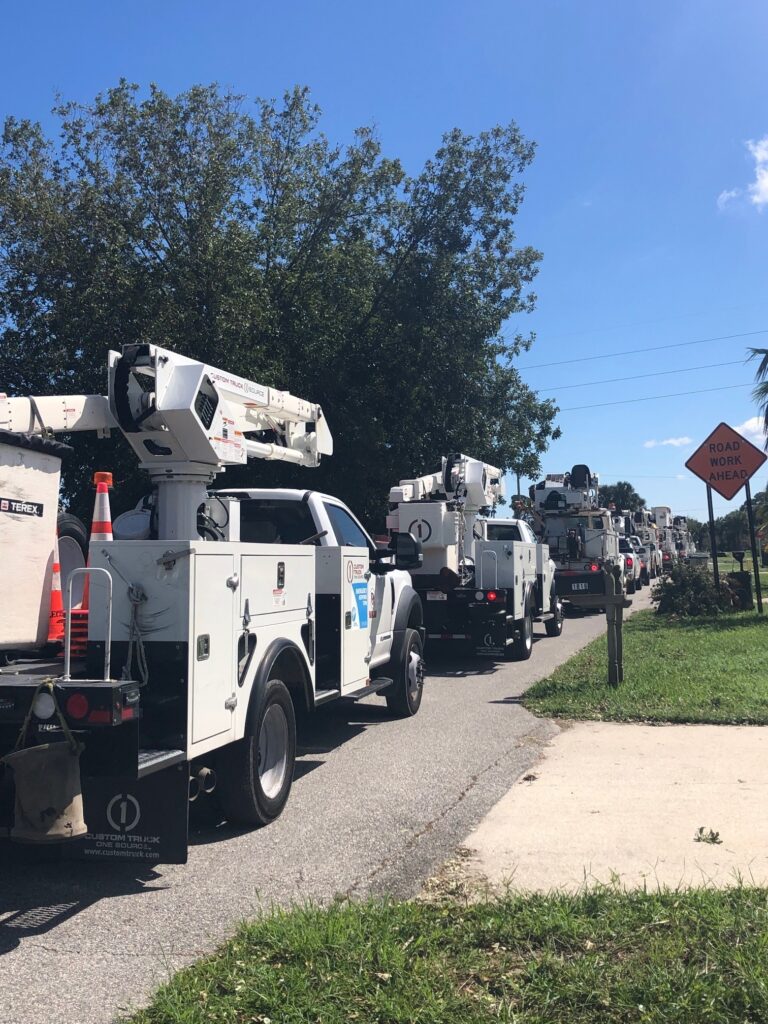Harlan Electric trucks ready and waiting to assist in power restoration in Florida.