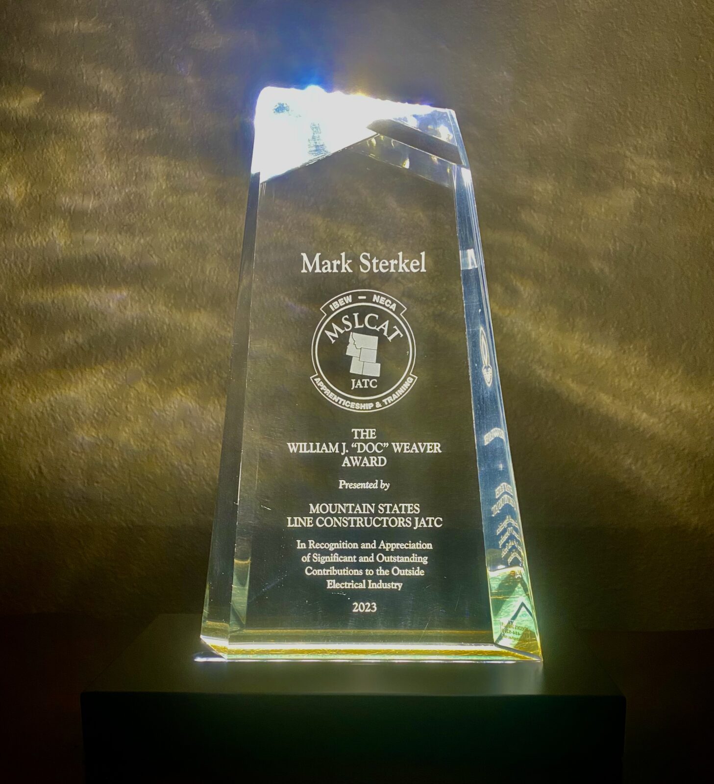 Doc Weaver Award glass trophy